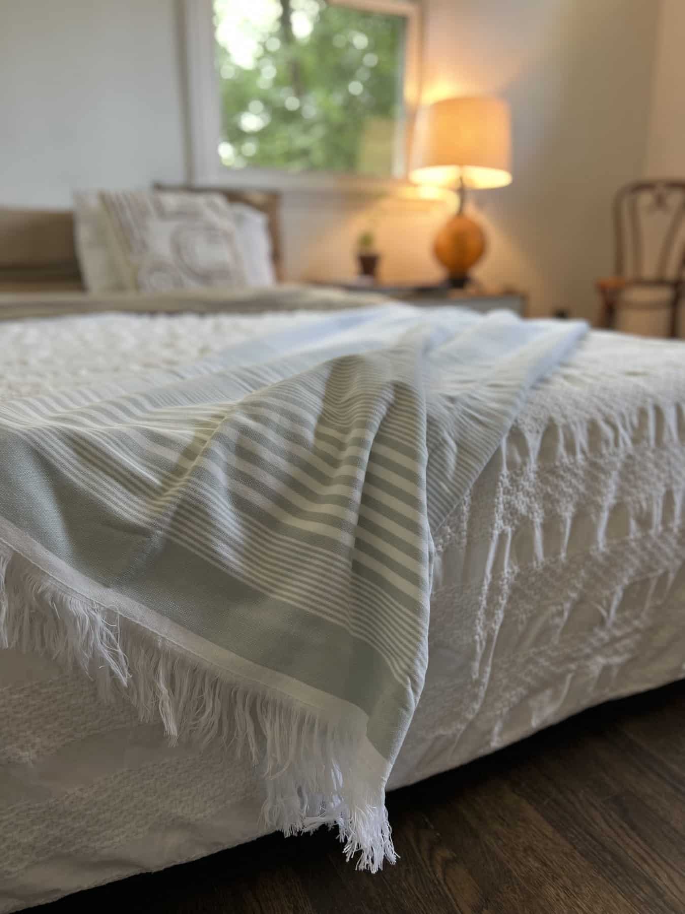 Delilah Organic Cotton On Bed Diagonal