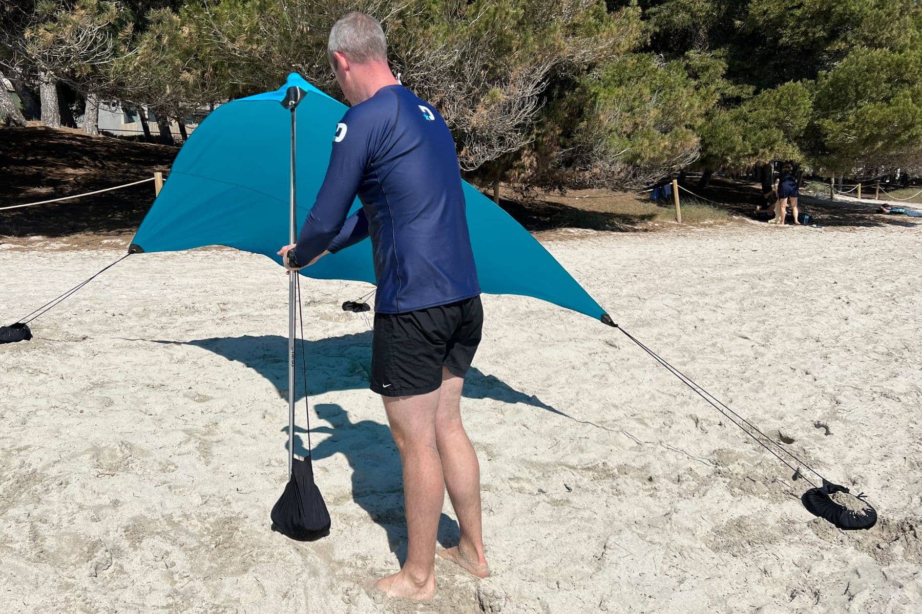 neso-tents-beach-torben-setting-up-tent