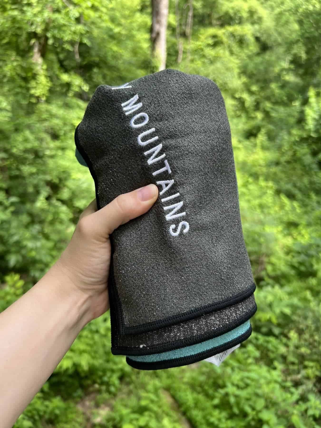 nomadix-original-folded-in-hand