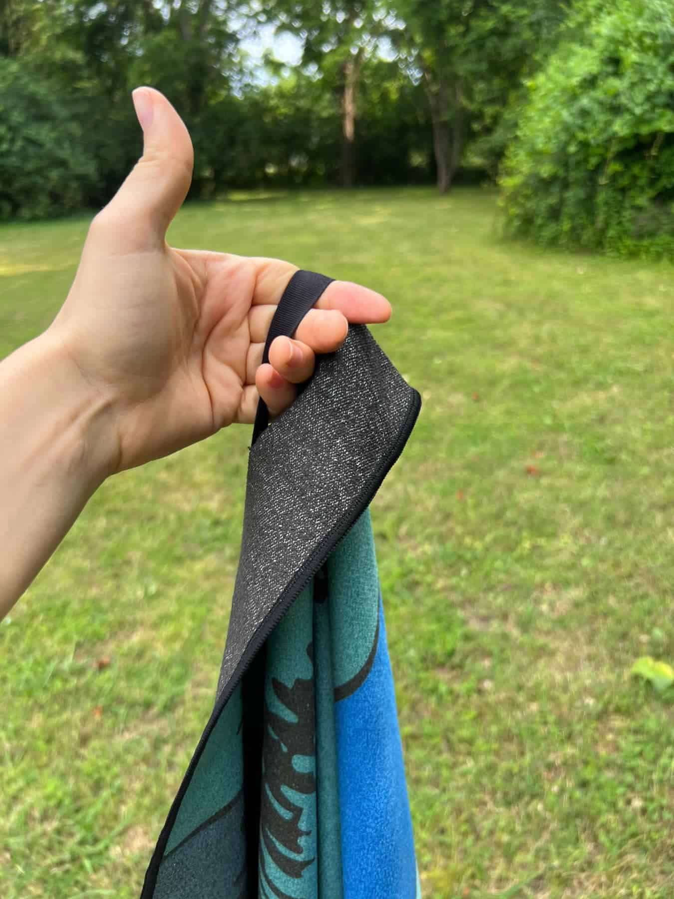 nomadix-original-hanging-in-hand