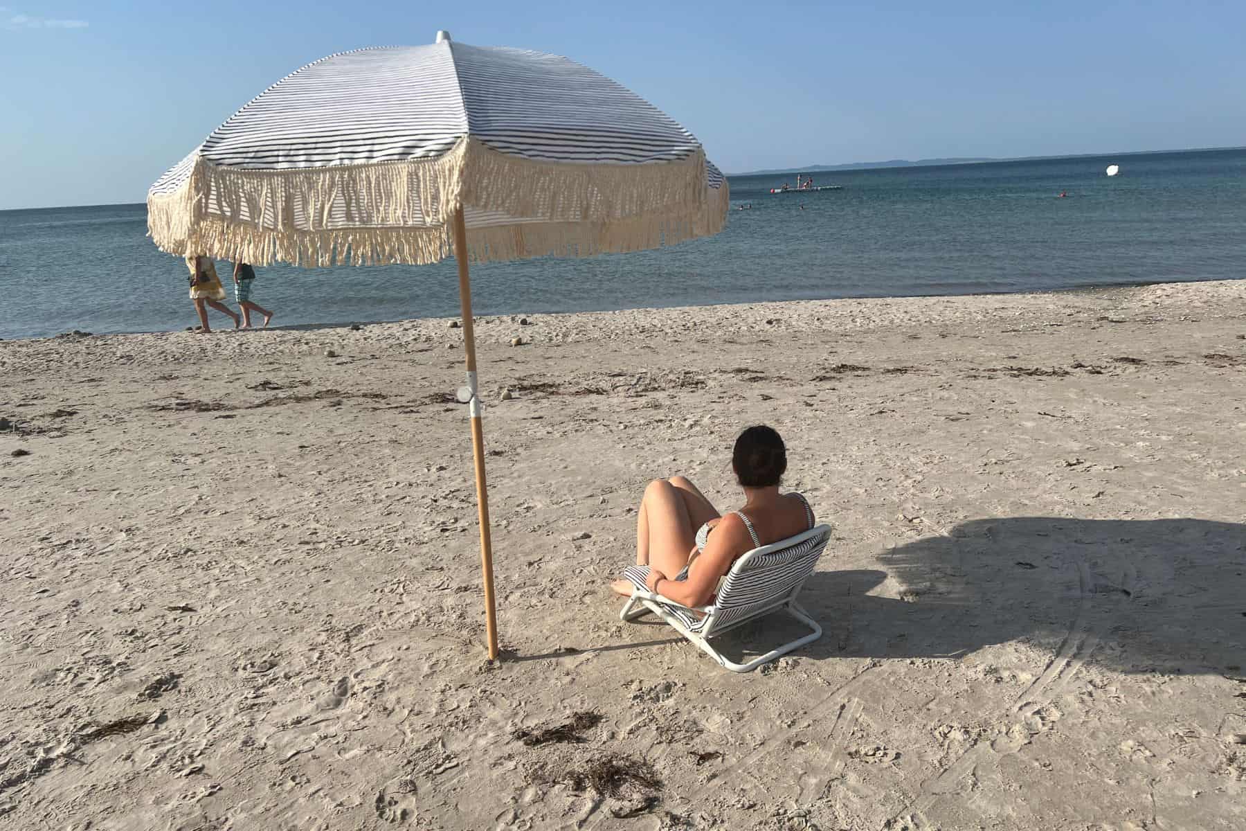 Sunday Supply Co Natural Instinct With Woman On Chair