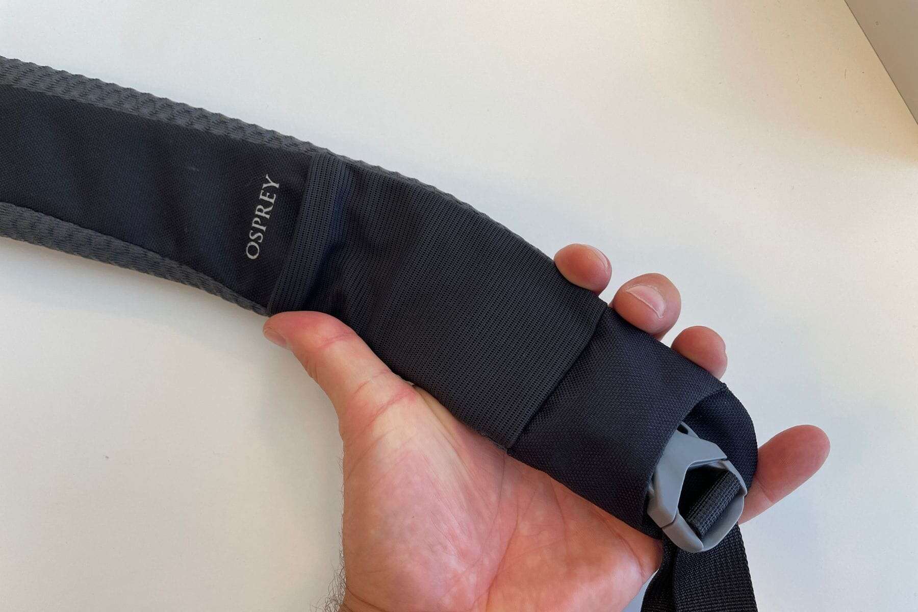 The Daylite shoulder strap has one lash point, a small mesh pocket and a bit of padding.