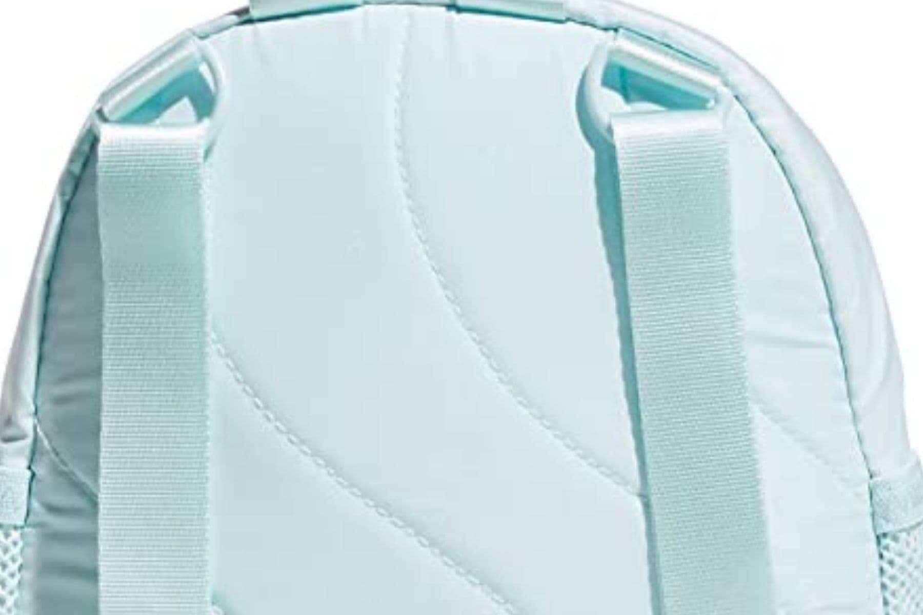 Adidas Linear Mini has typical webbings looping through D-rings. 