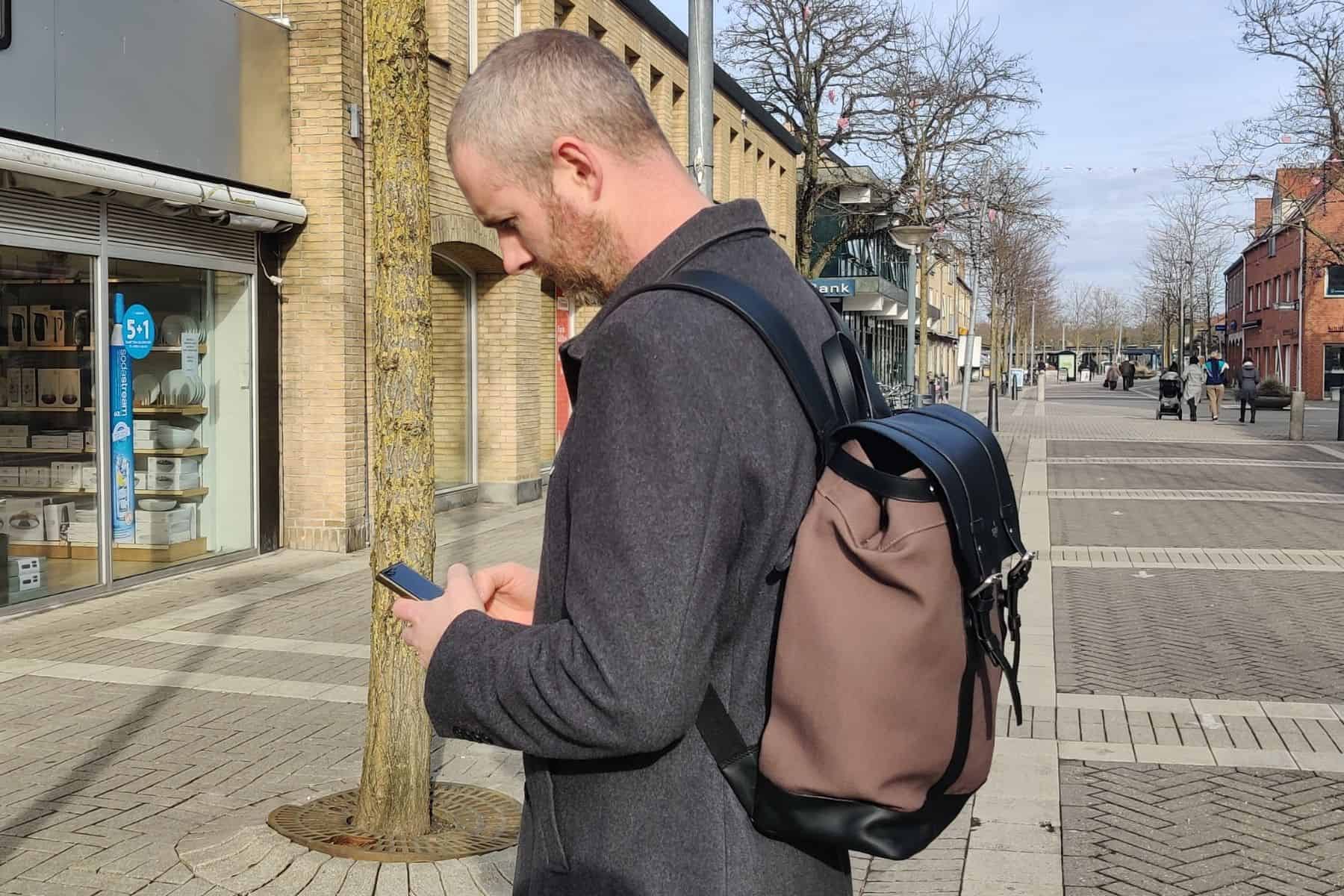harber-london-classic-rucksack-side-view-busy-street