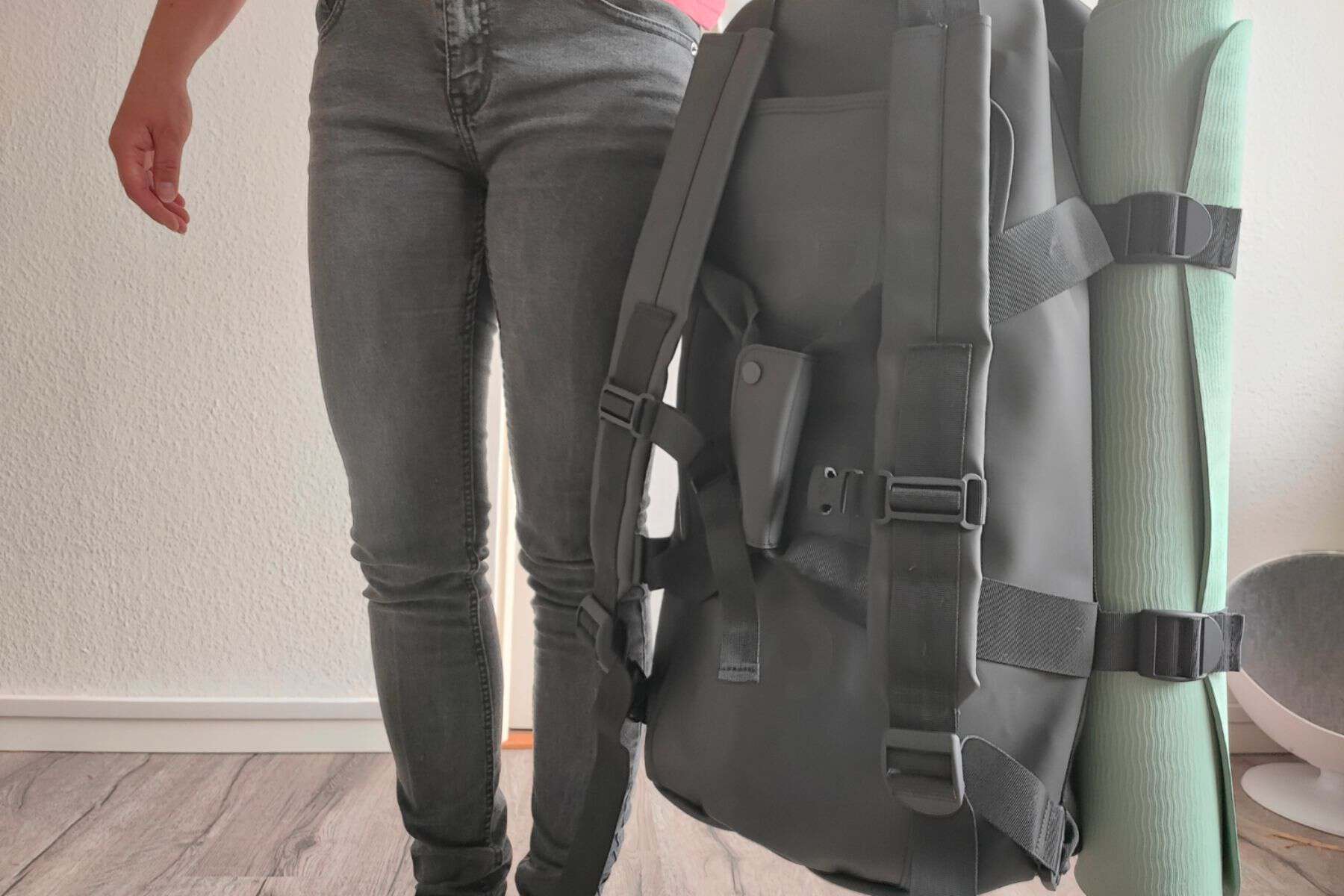 The Rains Texel Duffel bag can be carried as a backpack or a duffel bag.