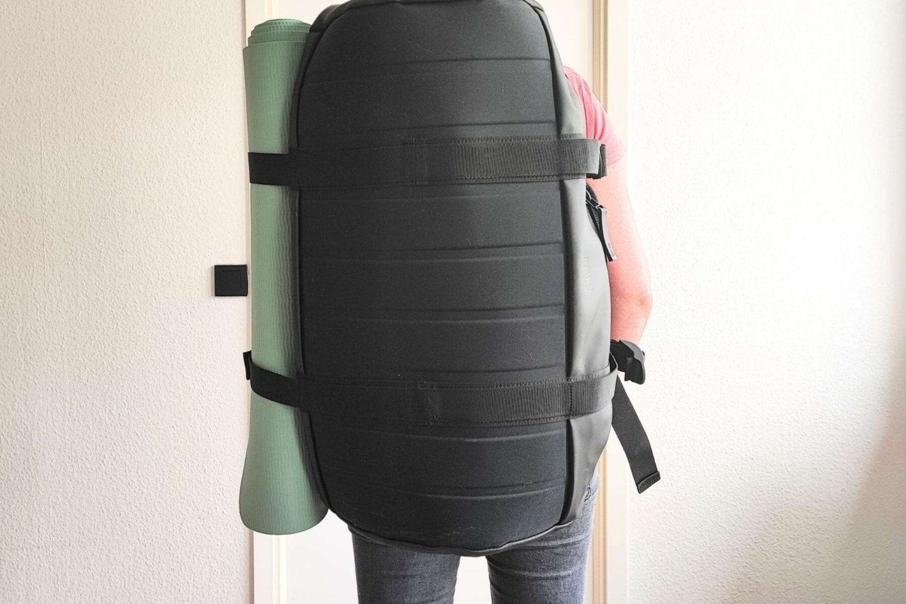 The Rains Texel Duffel has a solid waterproof bottom.