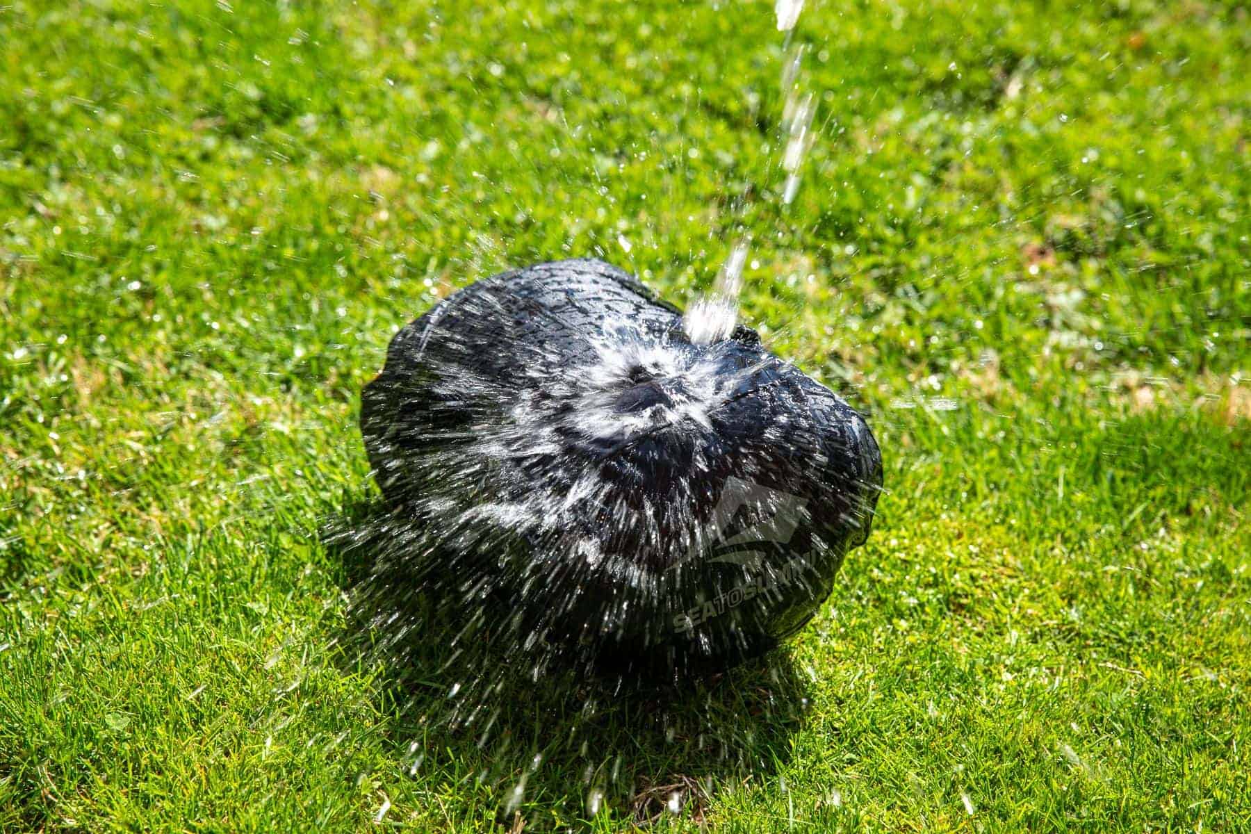 Subjecting the Evac to our rigorous garden hose trials
