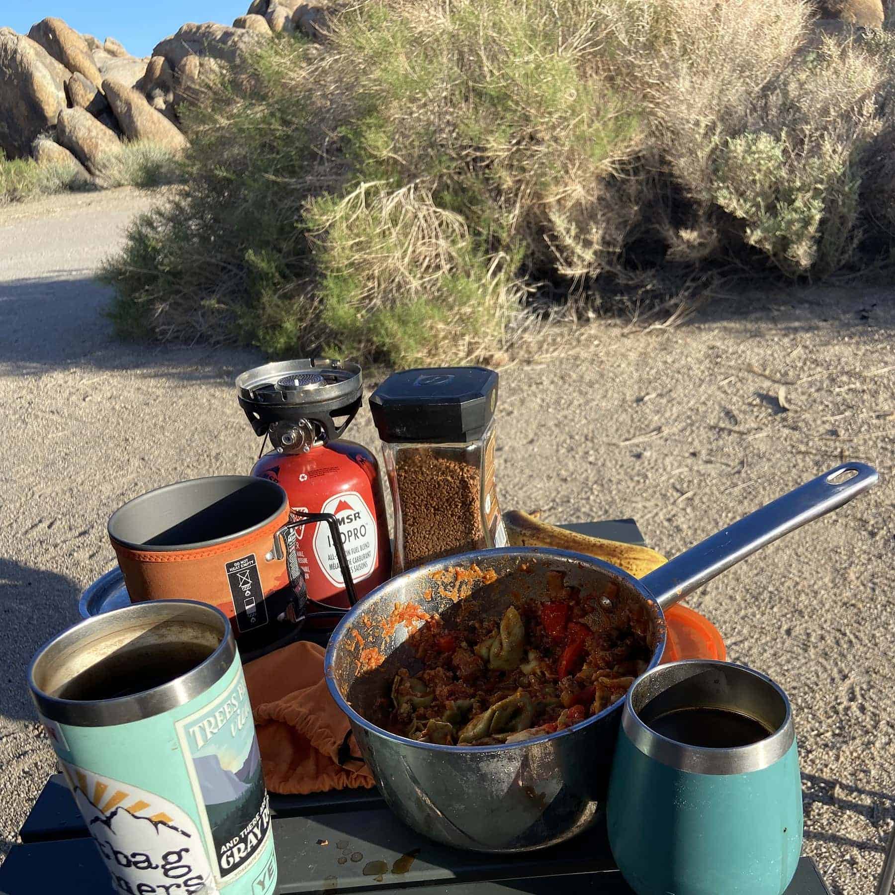 Using a Jetboil to whip up instant coffee, it goes great with leftover pasta from the night before
