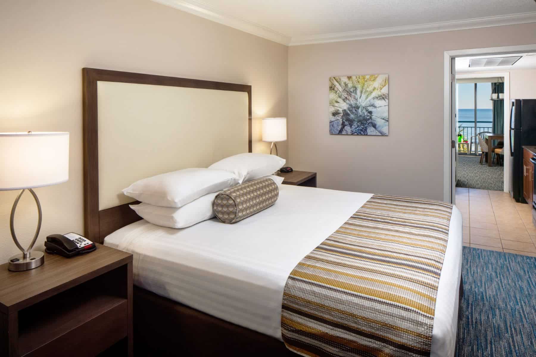 coral-beach-resort-and-suites-bed