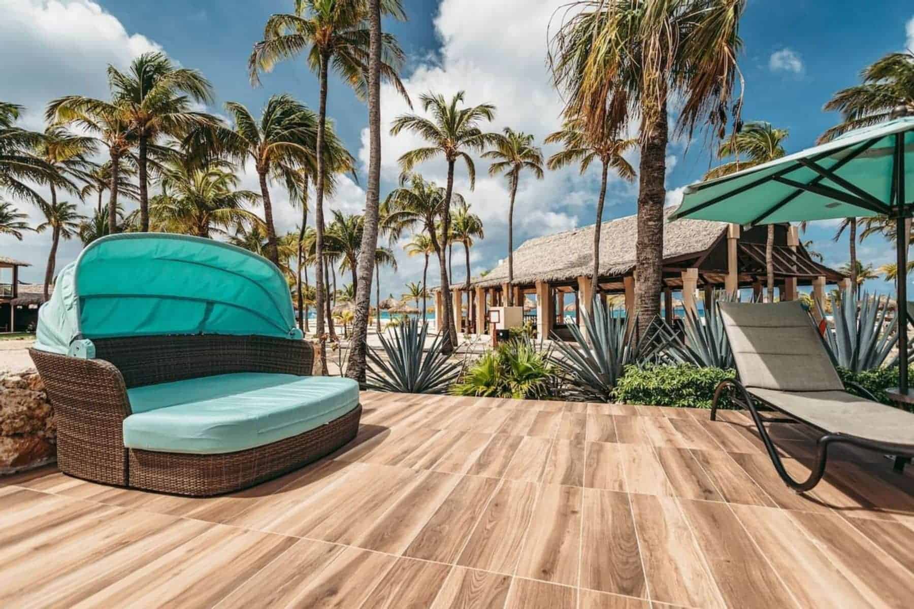 manchebo-beach-resort-and-spa-outside-bed